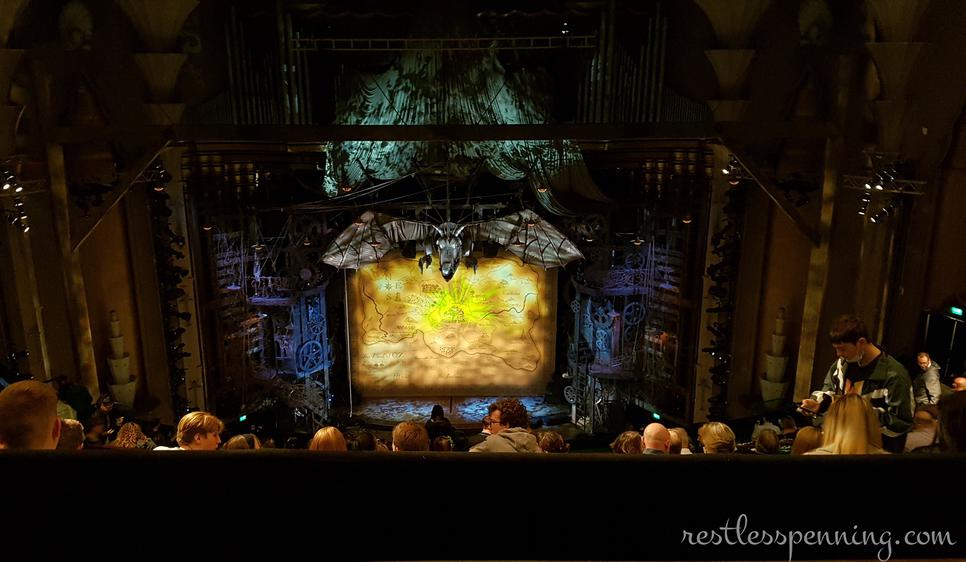 view of the theatre stage, of an animatronic dragon